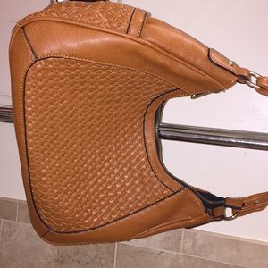 Very nice brown leather purse very comfortable